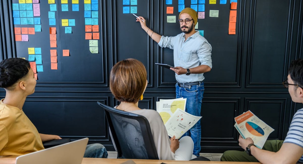 Businessperson analyzing lead generation data with magnifying glass